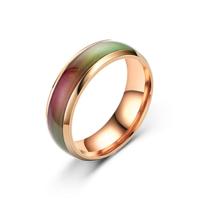 Smart discolor ring with rose gold band and temperature-sensitive color-changing surface, ideal gift for friends and trendy jewelry lovers.
